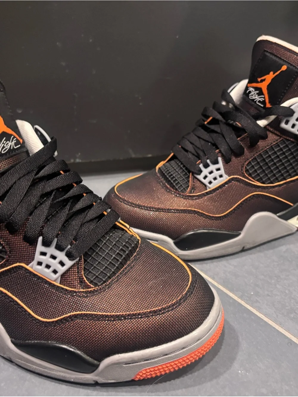 Jordan Black with Orange Trim High-Top Sneakers